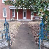 Brick Queen Anne, 3.5 stories. circa 1900